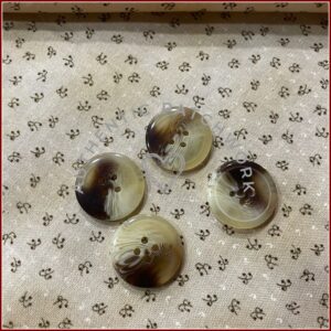 Blister botones Jaspeado 22 mm (4 uds)